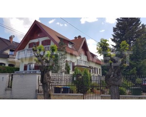 В зеленом Будайском (3-ем) районе продается уютный семейный дом